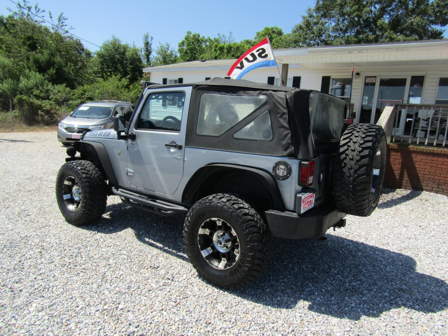 2014 Silver /Gray Jeep Wrangler Sport 4WD (1C4AJWAG5EL) with an 3.6L V6 DOHC 24V FFV engine, Automatic transmission, located at 15016 S Hwy 231, Midland City, AL, 36350, (334) 983-3001, 31.306210, -85.495277 - Photo#4